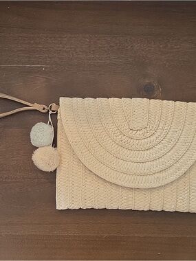 Neutral Straw Clutch with Pom Accent - Women's Bag